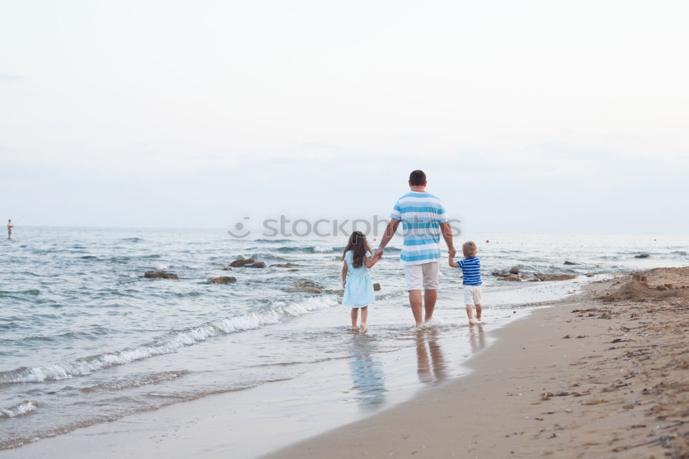 Similar – Image, Stock Photo Romantic bride and groom strolling on beach