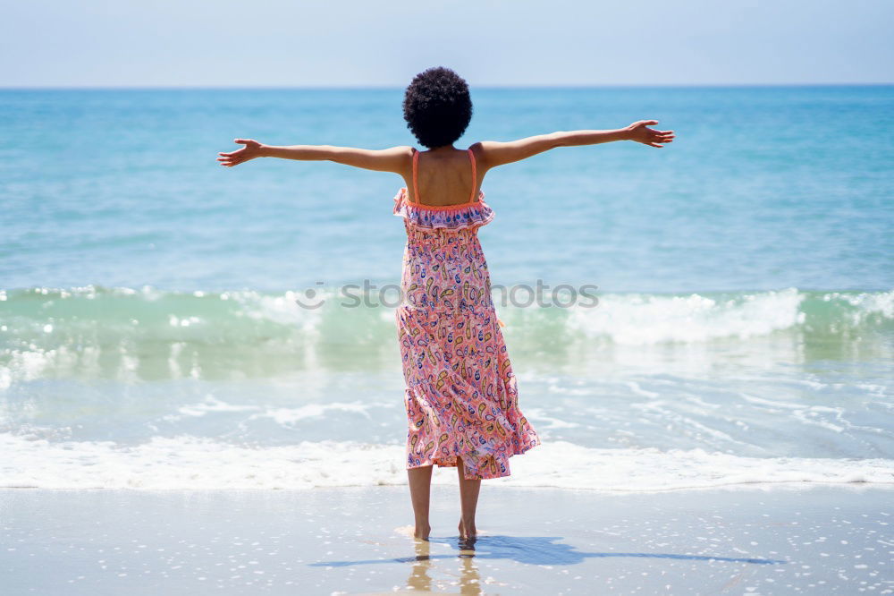 Image, Stock Photo woman with long pink dress on a tropical beach