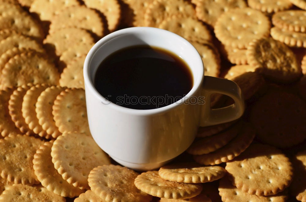 Similar – Coffee time. Candy Cookie