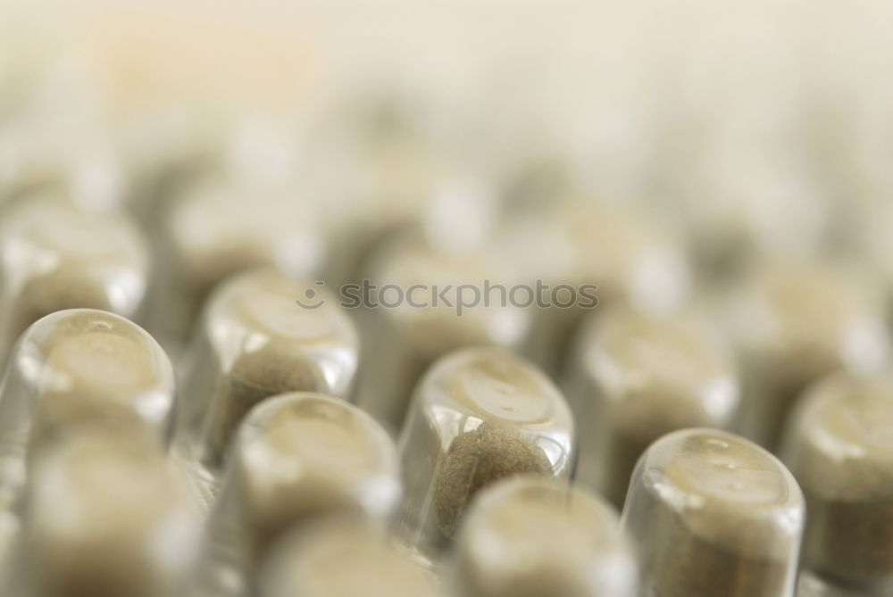 Similar – Group of thumbtacks pinned on corkboard.