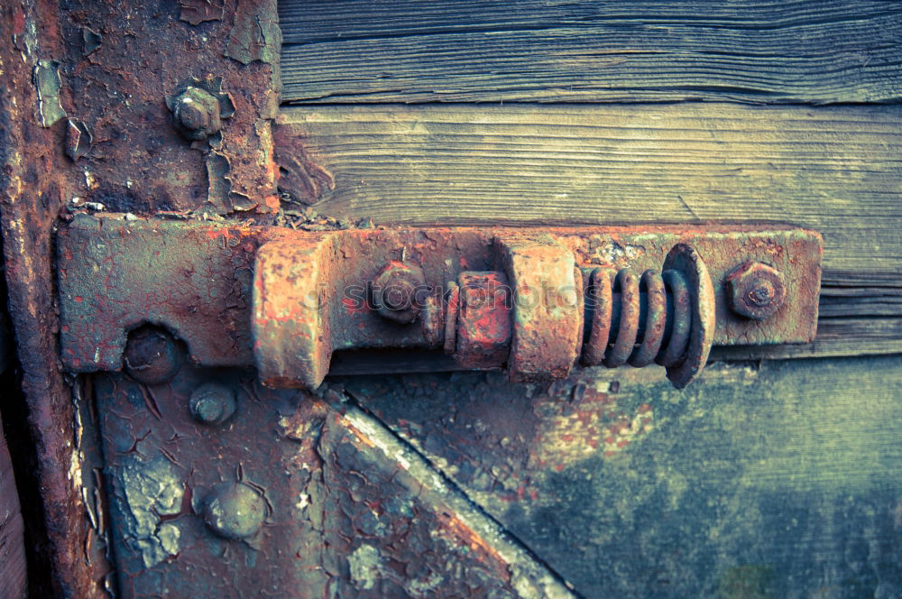 Similar – rusty garden gate closed with chain, with blurred background