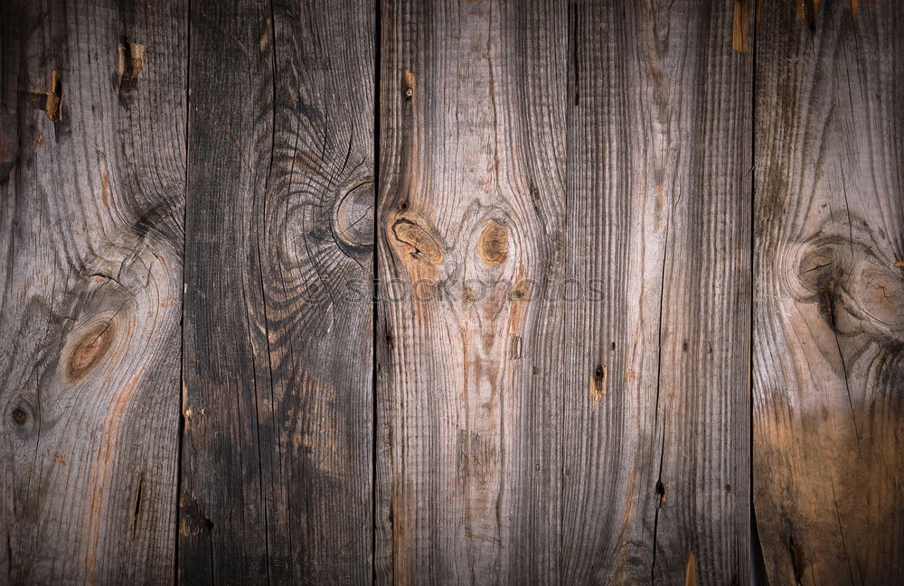 Similar – Stone heart shape on wood