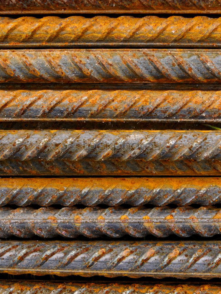 Similar – Rusty iron pipes wrapped with steel cable