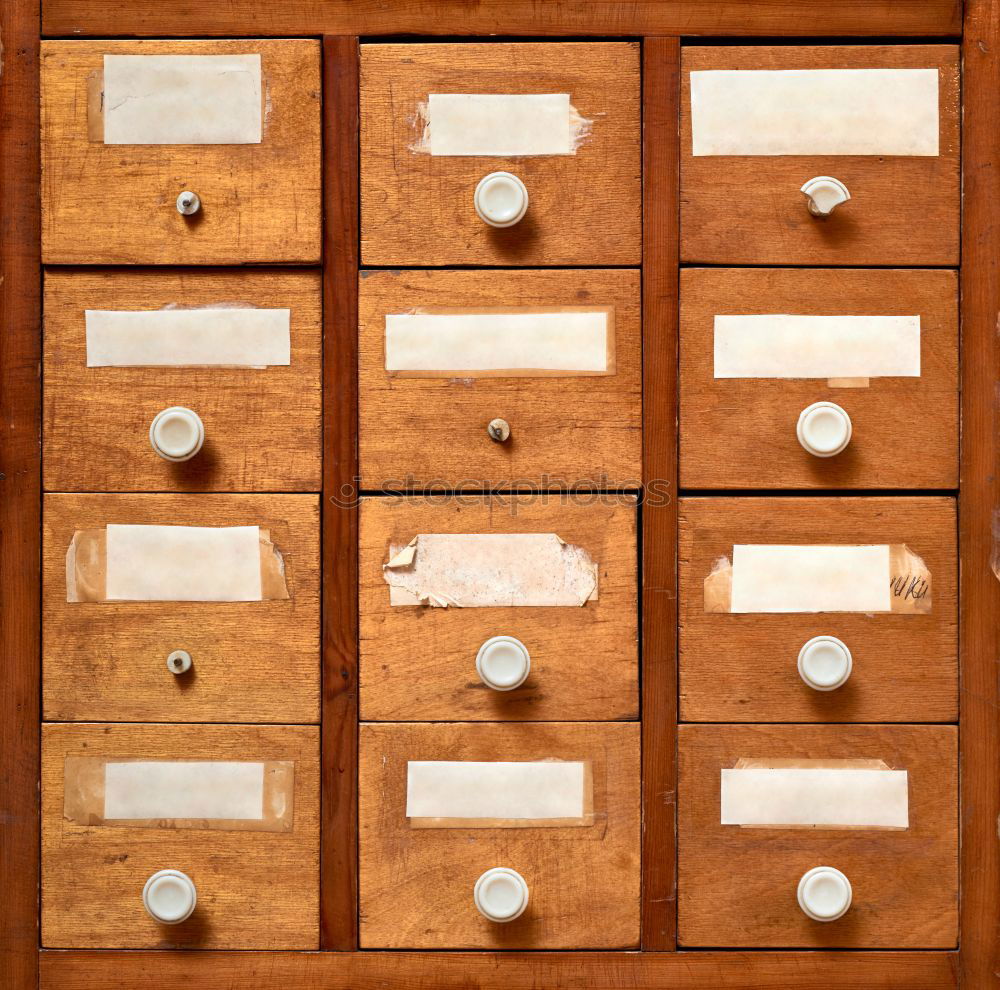Similar – Image, Stock Photo Old wooden cabinet with many drawers for small parts in the warehouse of a former factory building in the district of Margaretenhütte in Giessen on the Lahn River in Hesse, Germany