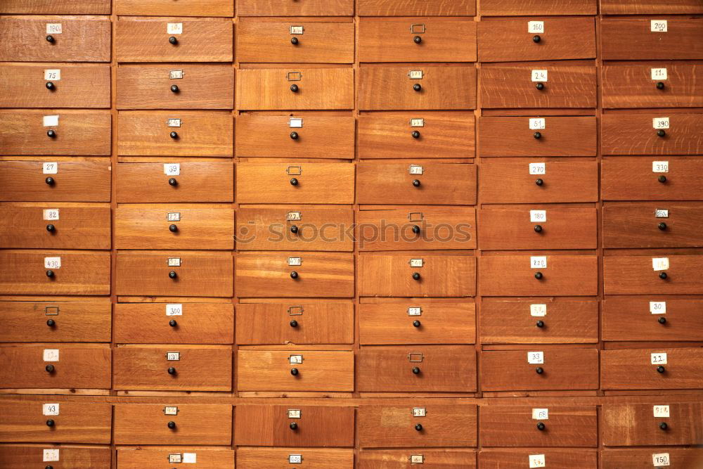 Similar – Image, Stock Photo Old wooden cabinet with many drawers for small parts in the warehouse of a former factory building in the district of Margaretenhütte in Giessen on the Lahn River in Hesse, Germany