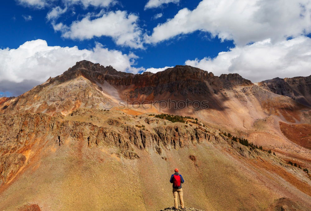 Similar – Hiker in the desert.