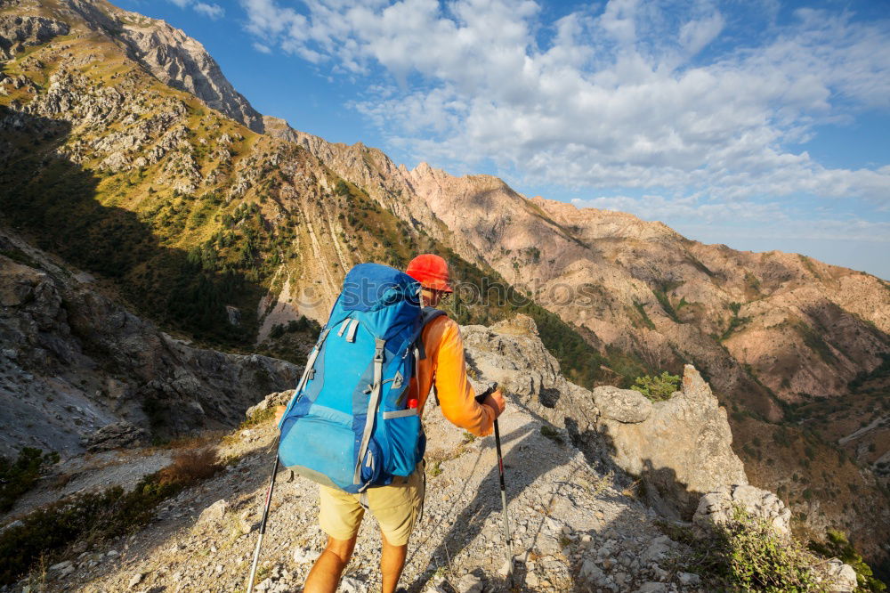 Similar – Woman refreshes herself while hiking