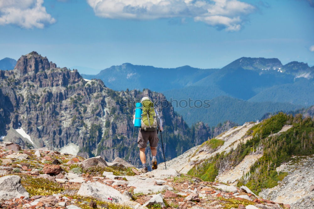 Similar – Image, Stock Photo Climbing sport: young boy takes a rest observing panorama