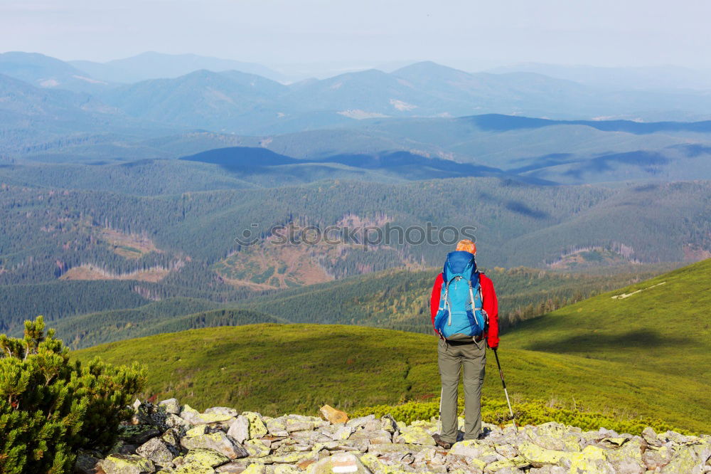 Image, Stock Photo Climbing sport: young boy takes a rest observing panorama