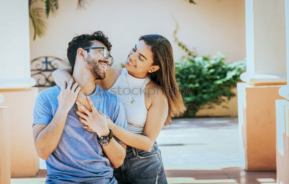 Similar – Image, Stock Photo Young couple walking through the city