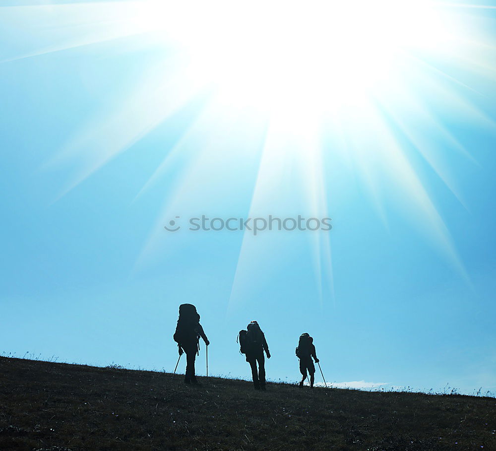 Silhouette of hiking friends