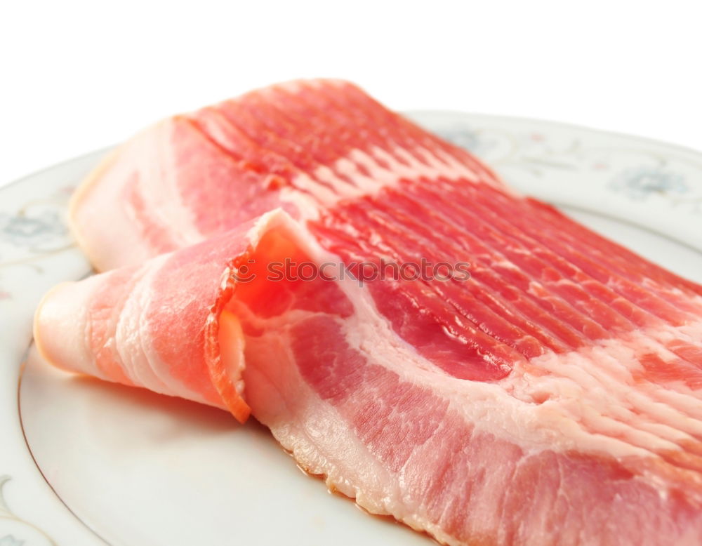 Similar – Image, Stock Photo Cutter carving slices from a whole bone-in serrano ham