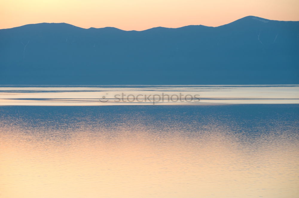 Similar – Song Kul lake with horses in sunrise