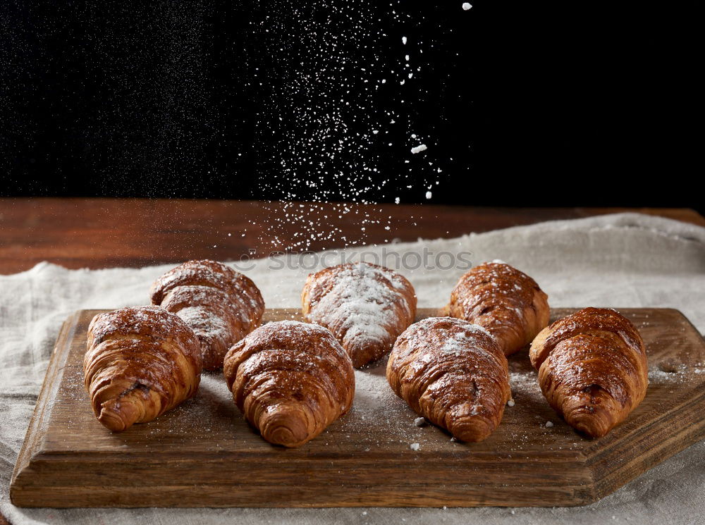 fresh bread and baked goods on wooden