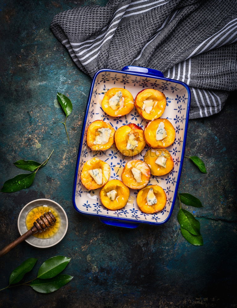 Image, Stock Photo Peaches with cheese and honey in a baking tin