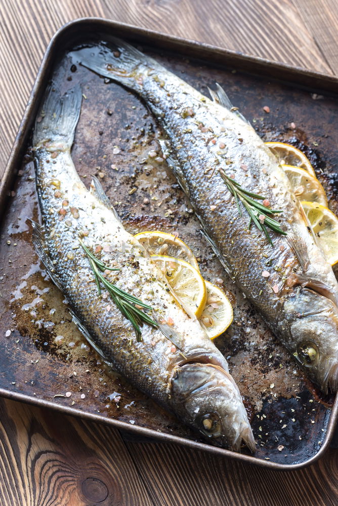 Similar – Image, Stock Photo Fried fish fillet on cast iron pan