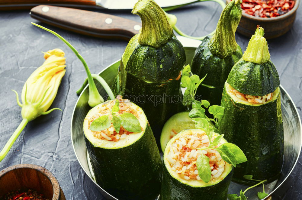 Similar – Pickled cucumbers made of home garden vegetables and herbs