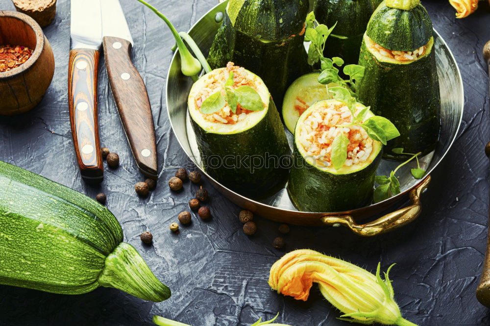 Similar – Pickled cucumbers made of home garden vegetables and herbs