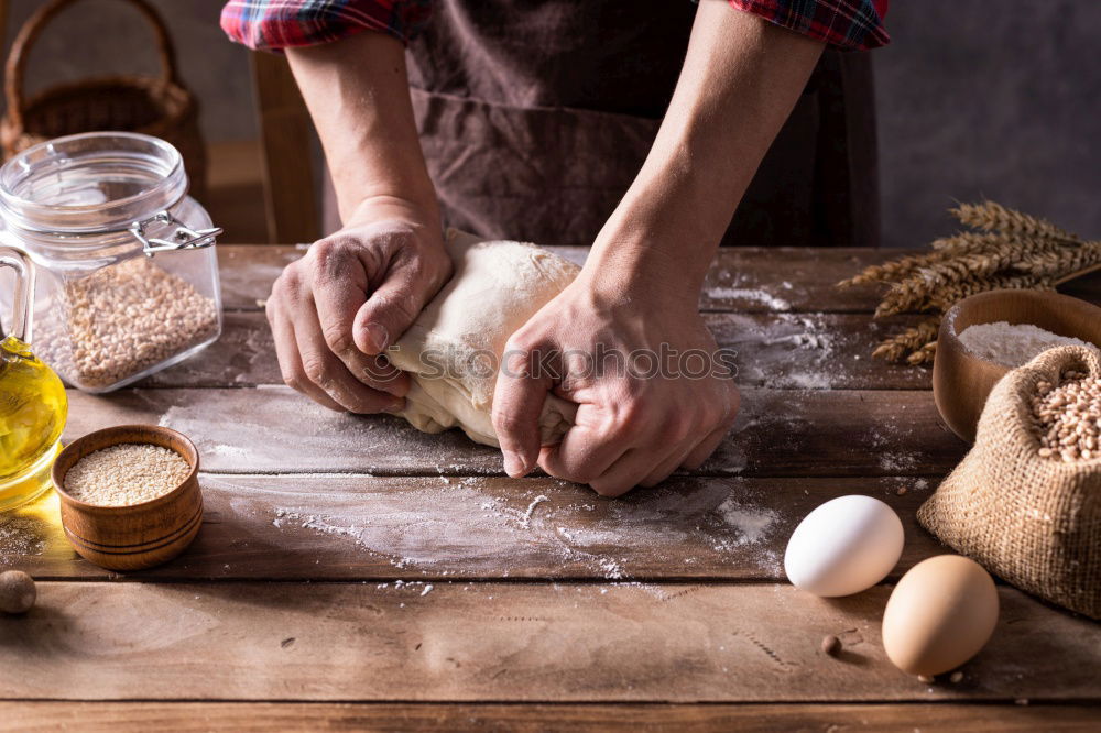 Similar – Tying a rope on fish for grilling