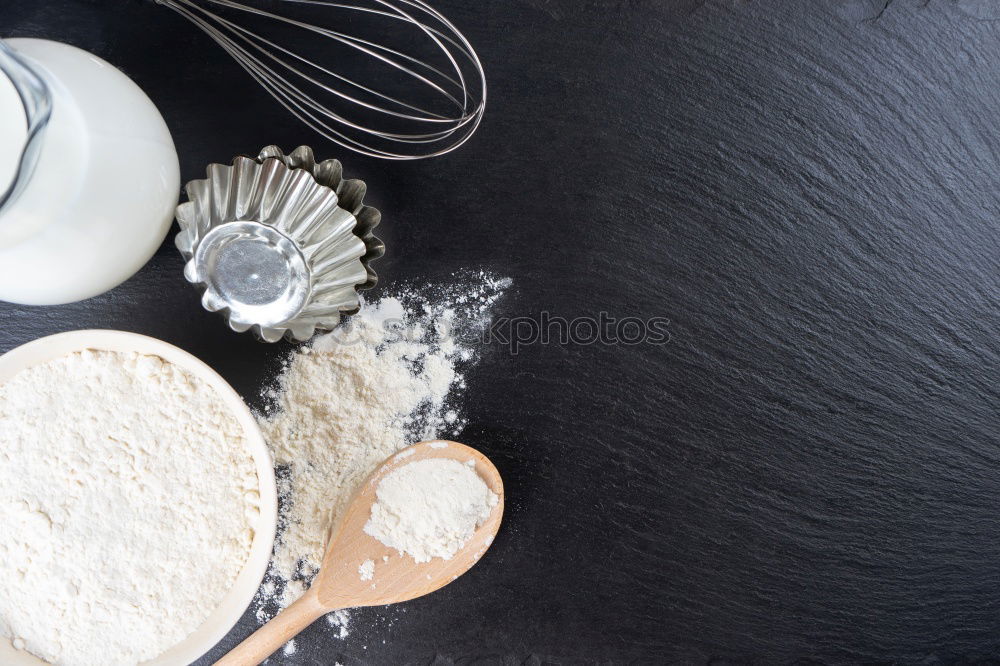 Similar – Image, Stock Photo White salt in a wooden bowl on a black surface