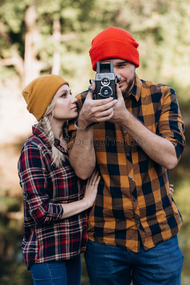 Similar – Image, Stock Photo Happy couple hugging and kissing near tree in park