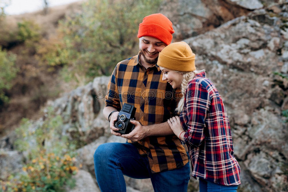 Similar – Elferly fit happy couple hiking through forest together on vacation