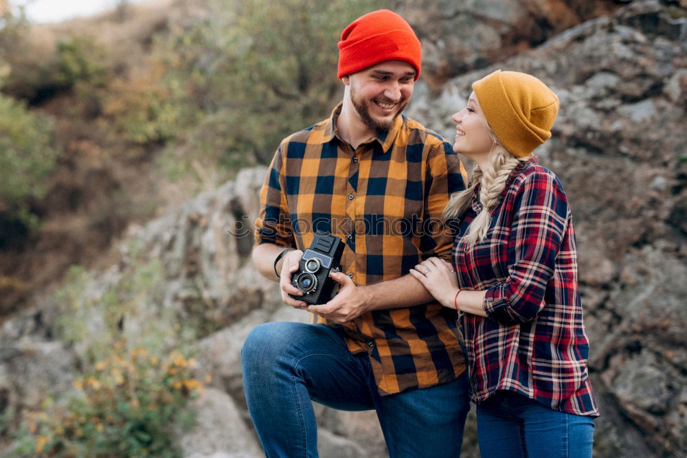 Similar – Image, Stock Photo Happy couple hugging and kissing near tree in park