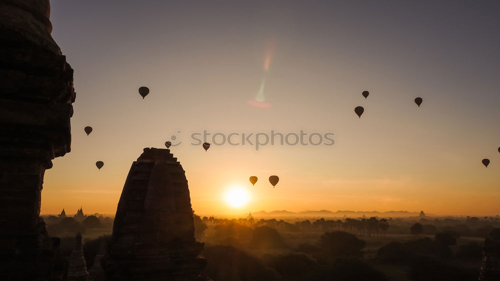 Similar – Image, Stock Photo Birds and hot air balloons above Bagan