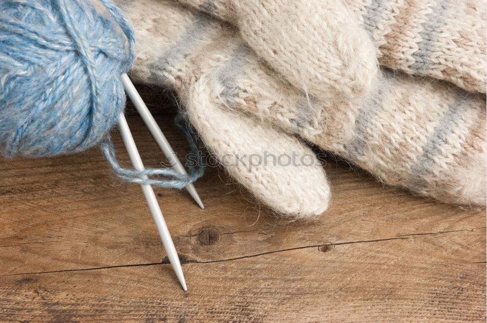 Similar – Pliers and twine on a plank