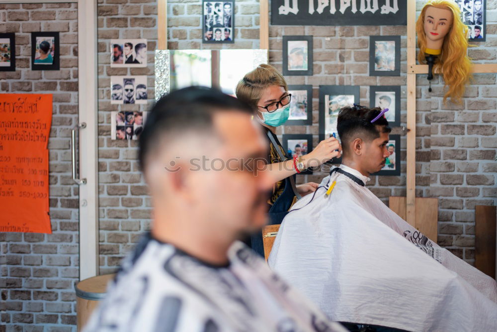 Similar – Image, Stock Photo Barber using grooming machine