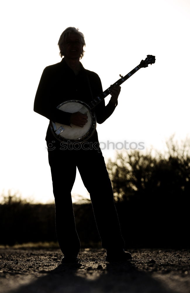 Similar – Image, Stock Photo Man with guitar on field