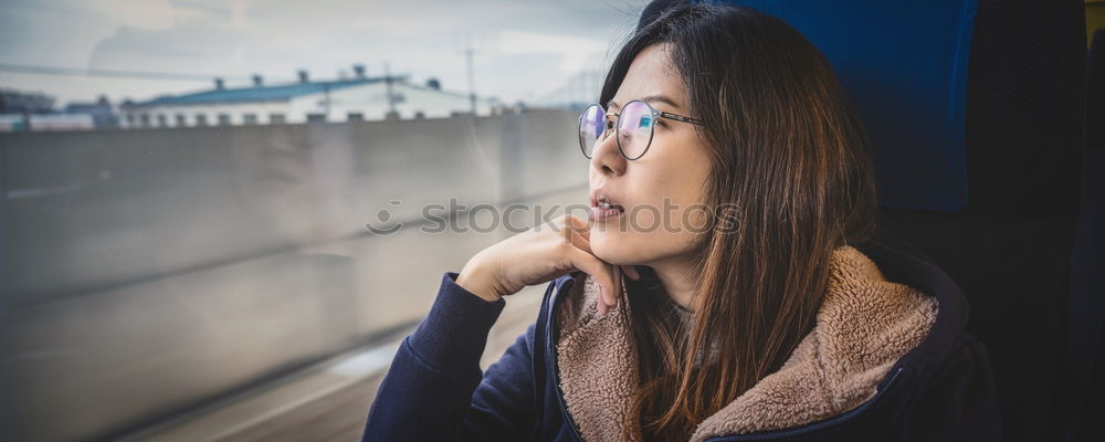 Similar – Young girl sitting on the floor and smoke