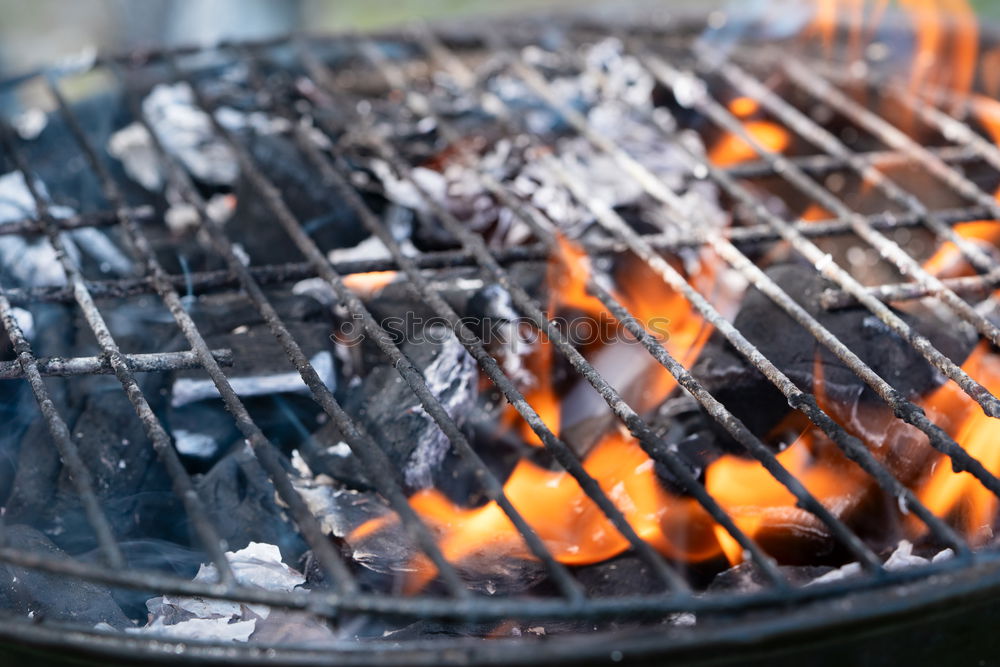 Similar – Hot coals with smoke in grill