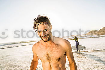 Similar – A man with a big belly in swimming trunks on the beach