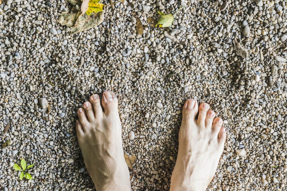 Similar – Image, Stock Photo a man Looking down on feet, selective focus