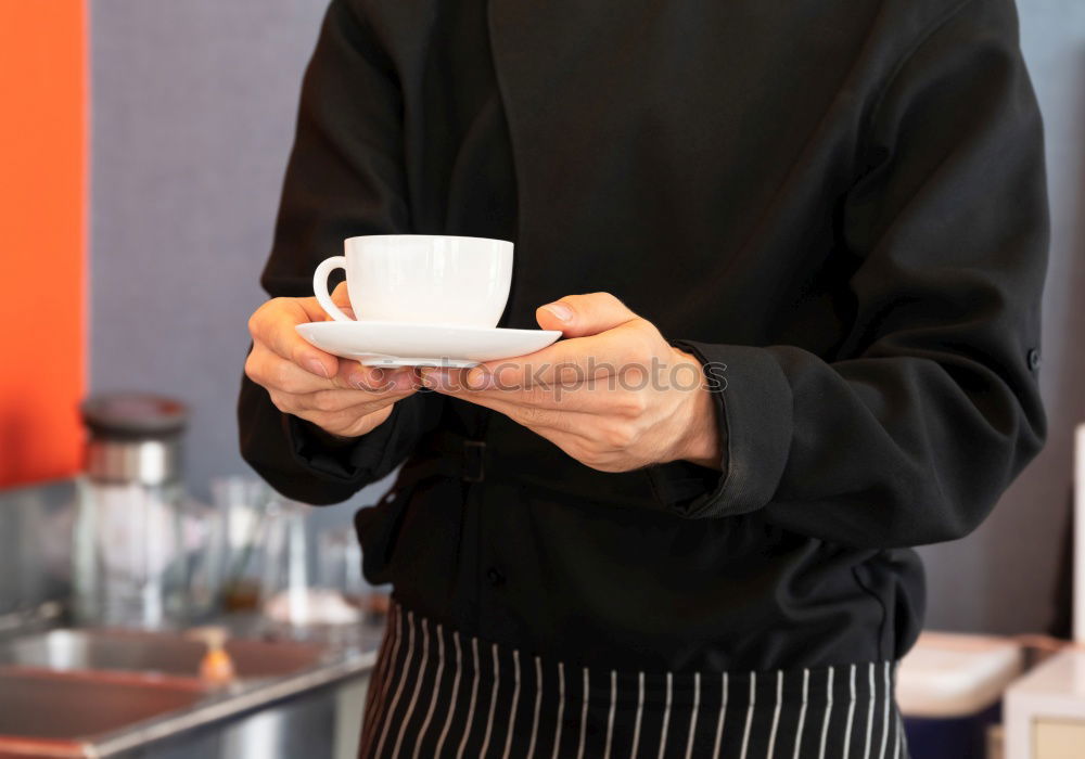 Similar – Image, Stock Photo Barista holds out a Cup of coffee