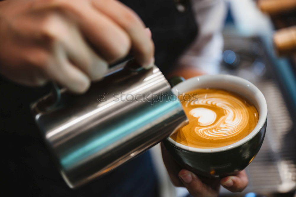 Similar – Image, Stock Photo Barista pouring hot milk prepare latte art on cup of coffee