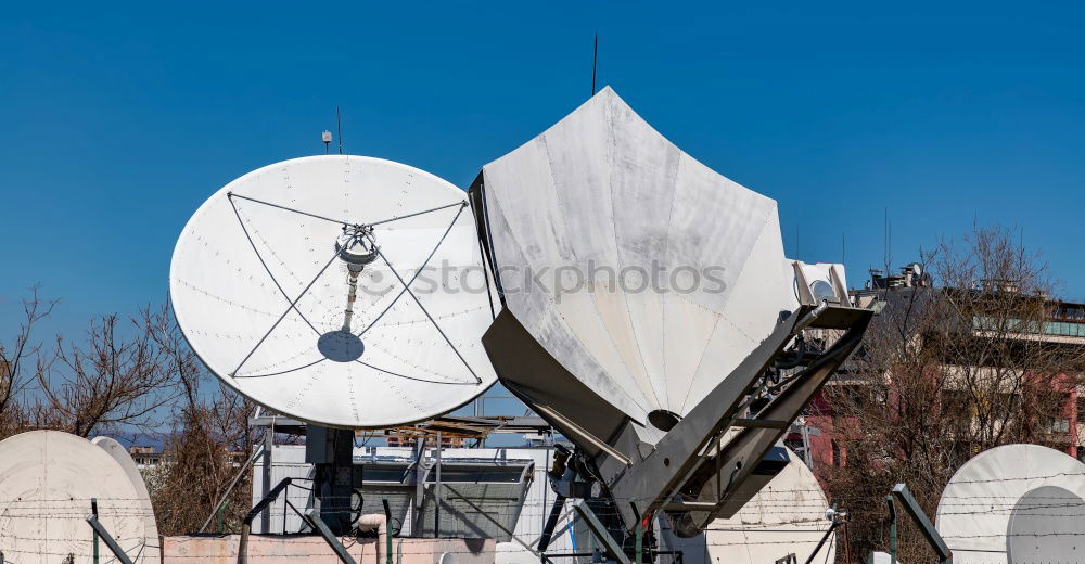 Similar – Satellite dish on the roof of a car