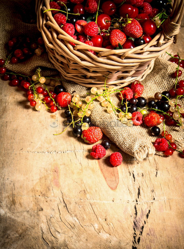 Similar – Image, Stock Photo Red and white currants with bowl and wooden spoon