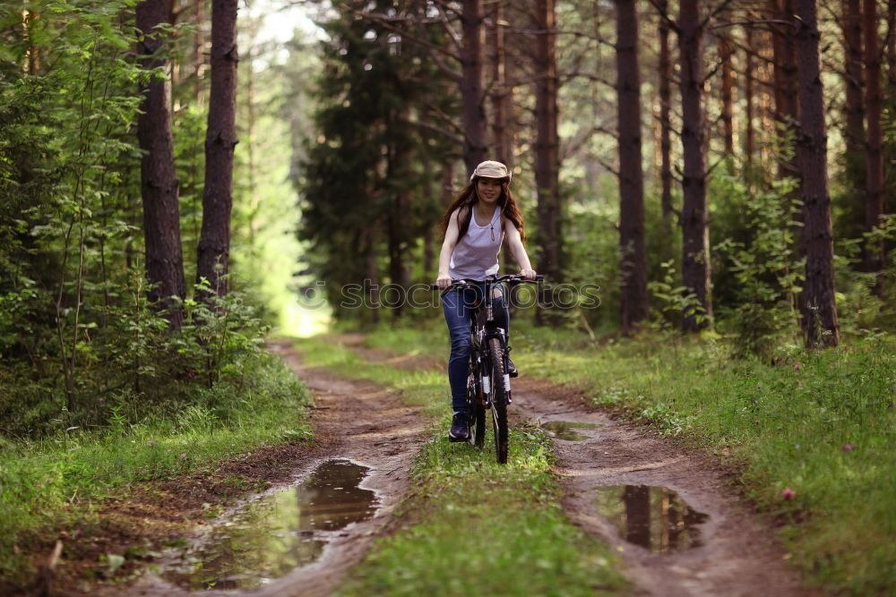 Similar – Image, Stock Photo Athletic woman out jogging in a forest