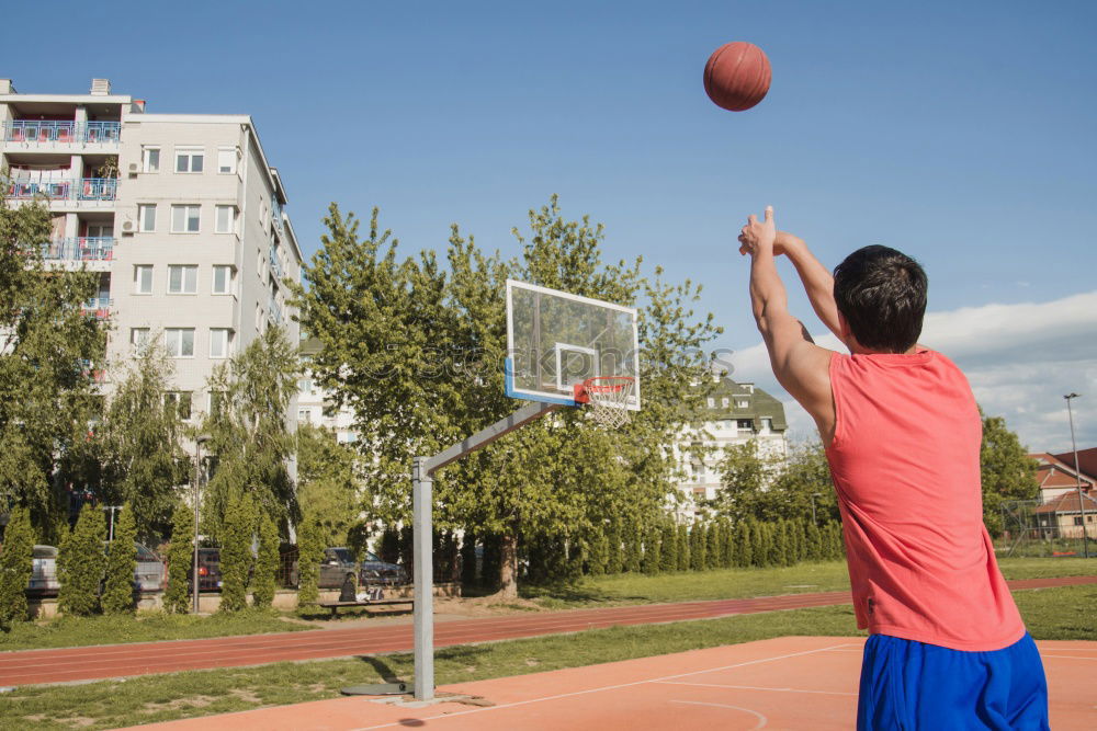 Image, Stock Photo Young redhead woman in a basketball court