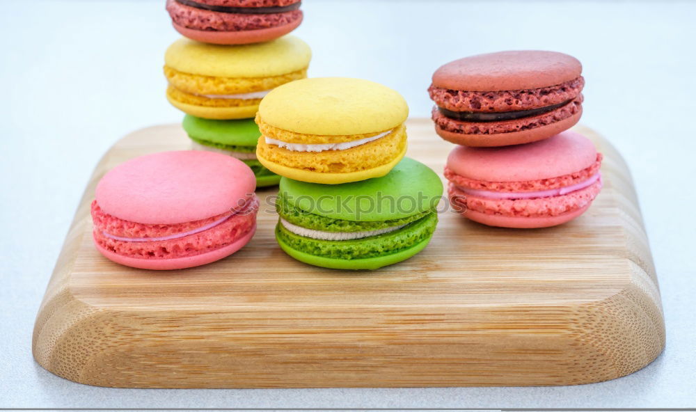 Similar – Image, Stock Photo Colorful macarons on white wooden table