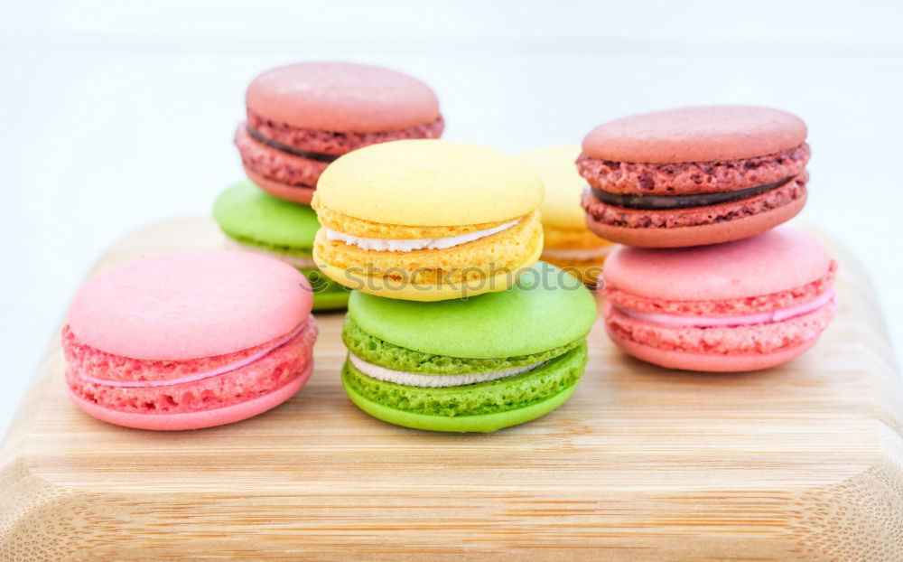 Image, Stock Photo Colorful macarons on white wooden table