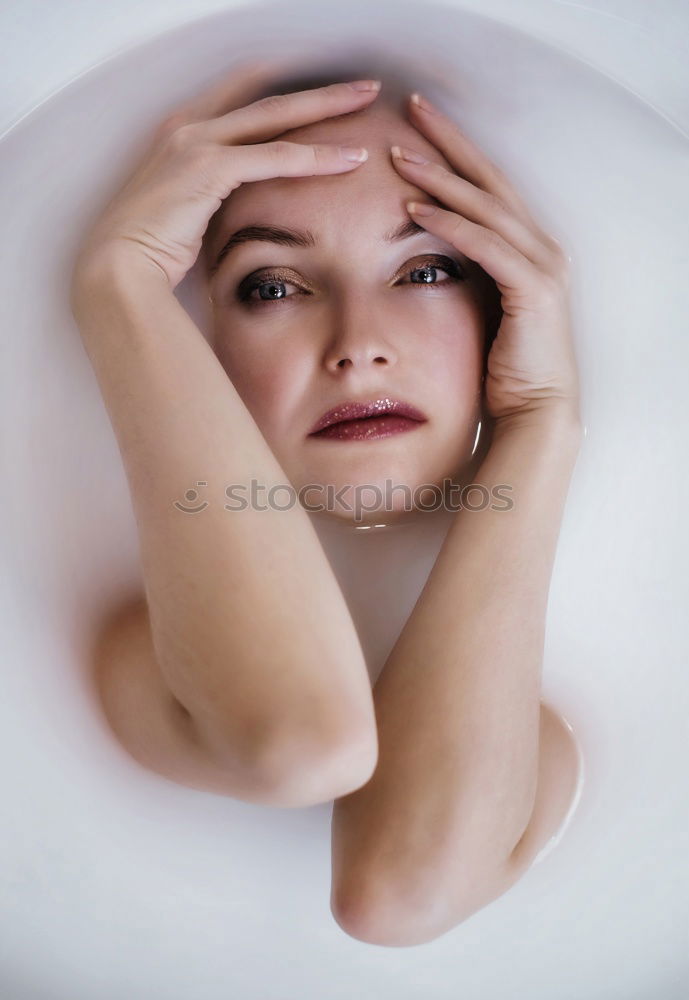 face of a teenager; hair and body in white