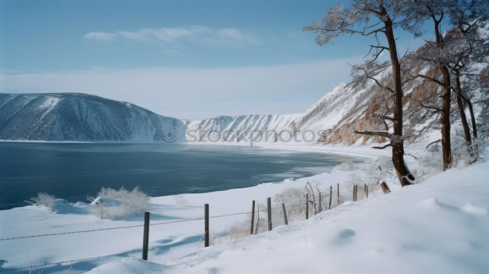 Similar – Half-frozen lake in idyllic winter landscape