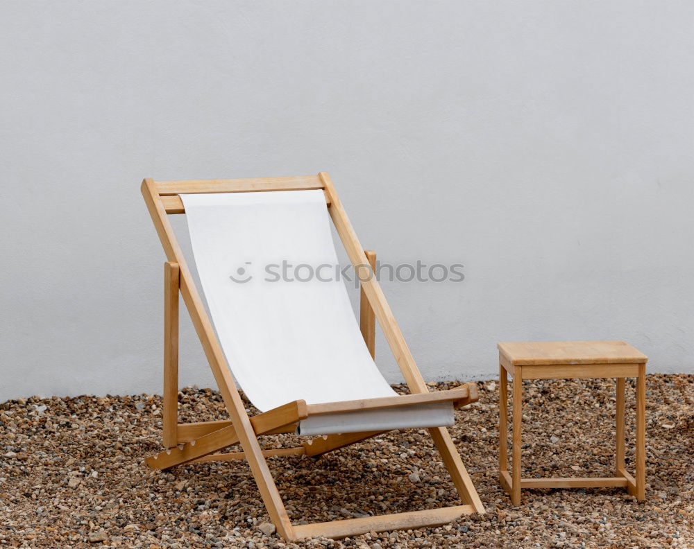 Similar – empty chairs Deckchair