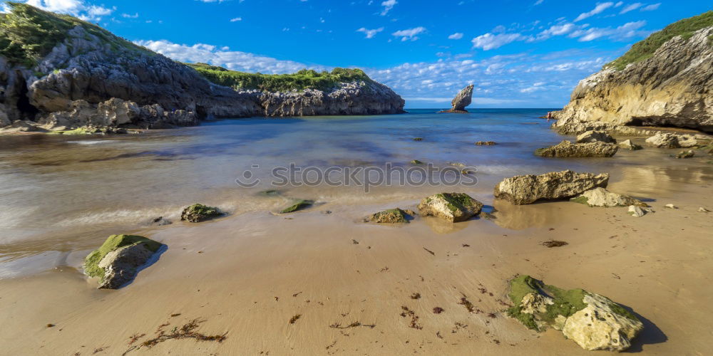 Similar – Sandy shore and mountains