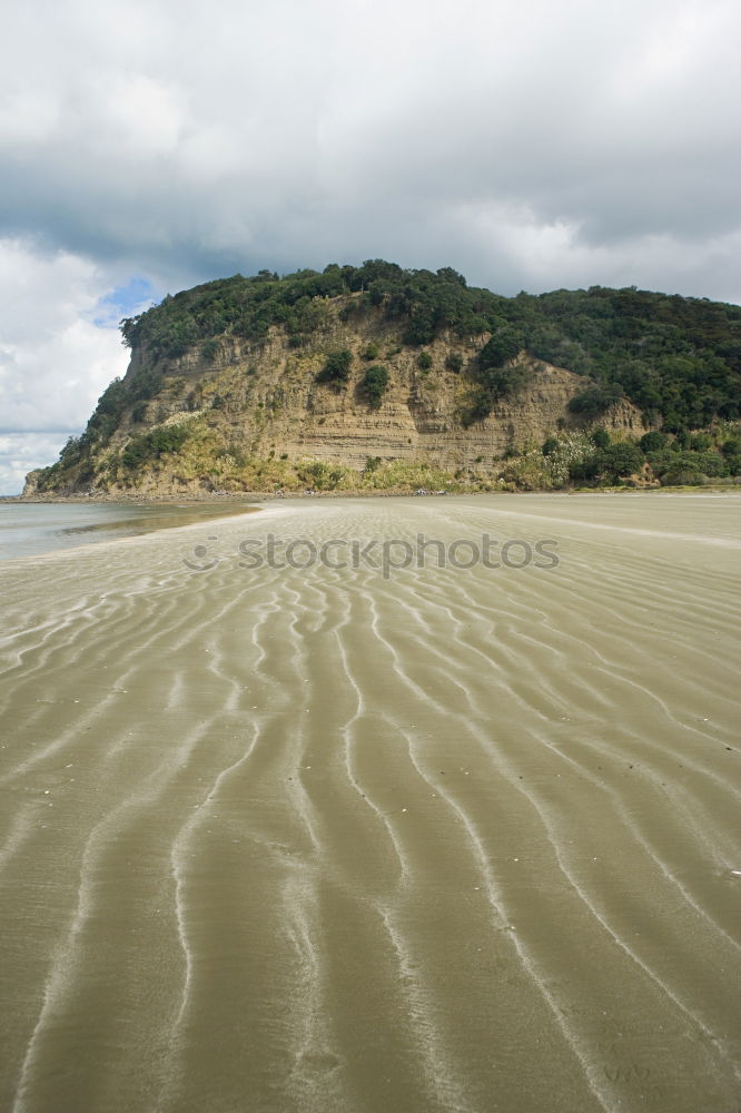 Similar – Sandy shore and mountains