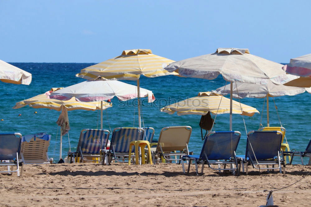 Similar – Empty deckchairs on the beach