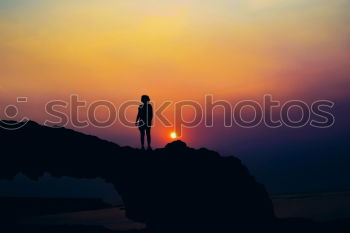 Similar – Image, Stock Photo The silhouette of man sitting alone at the beach